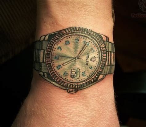 rolex oro tattoo|rolex wrist tattoos.